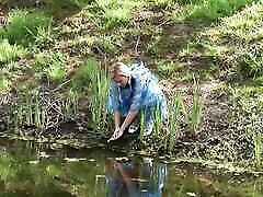 A Blonde tit jiggle dance Braids Rund Through a Field Until She Finds Two Cocks to Suck