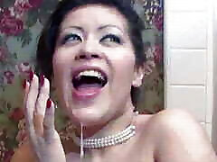 Busty Asian Brunette Has a Great Time Sucking off Her Hunky Man in the Bathtub