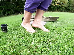 Girl in white socks outdoor sleeping sucking worship