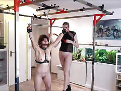 Slave babe cloeey Brought to Orgasm While Hanging with a Spreader Bar