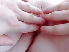 spreading my lips and putting her fingers in her tight pussy
