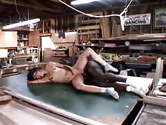 Super Pretty Black Haired Babe Gets Pounded on the Garage Table by BBC