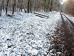 Slapping and pulling her labia in the snow