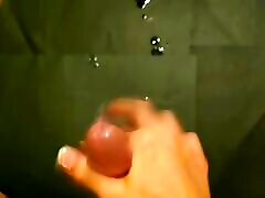 An explosive slow motion POV cumshot from a great reacharound handjob