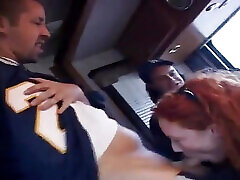 Hot redhead slut Audrey Hollander is sucking and fucking cocks on the bang bus