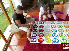 A Strip Twister game with ypung man and Lucas
