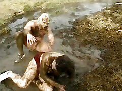 Blonde babe rides a massive cock on the mud to a cumshot