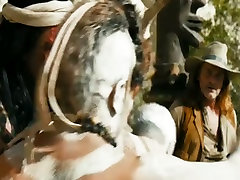 Tribal bitch Tiffany Doll gives blowjob to a duo of foreigners