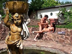 Sexually charged brunette teeny is getting rammed hard doggy style outdoor