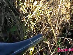 dalam asarama slut sits on lawn and gets her twat poked with blade