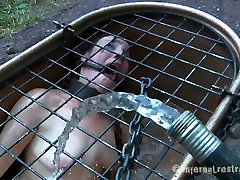 Obedient brunette slave girl involved in breath playing