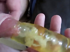 Cum into waterfilled condom under foreskin!!!