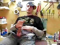 Horny guy masturbating in the garage