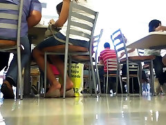 Pretty mexican girl shoeplaying in the mall