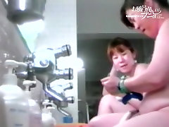 Asian girls are staying under the streams of shower water smallo mg tp 03241