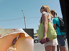 Dirty upskirt in public caught by bolt cameraman