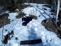 Hogtied in snow.