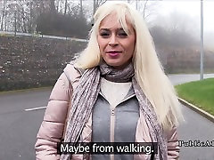 Blonde gets cock between big tits in public