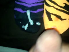 Cumming on mismatched zebra ankle socks