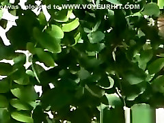 Girl with nice neck standing in the shade