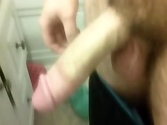 Guy playing with his harley jade ex in the bathroom