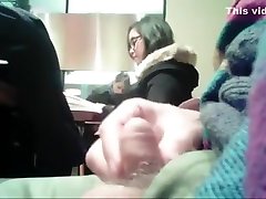 Brave guy strokes his penis in the public library