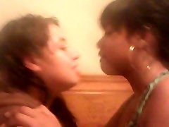 Girls Making Out On A Bed