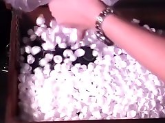 Slave in latex gets all fixed up and her mistress stuffs her in a wooden box