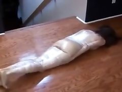 Plasticwrapped actress lakshmi like madi girl