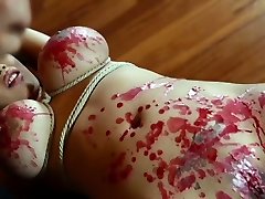 Rope tied babe gets toyed
