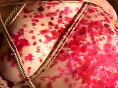 Kinky Asian slavegirl gets drenched in molten wax