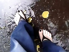black toenail polish and black spiceal sex flip flops