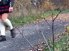 Nice ass in scotch skit with pony tail is walking