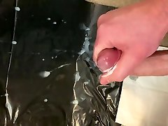 splattering cum on black background!
