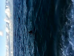 Chubby redhead in ocean slowmo.