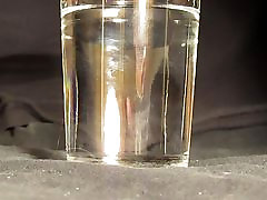 cocktail - cock and tail cumming into a glass of vodka