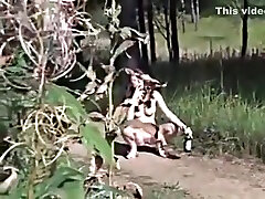 A Russian brunette drinks beer and pees