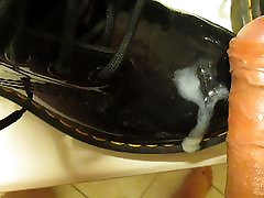 Cumshot on shiny Doc Martins
