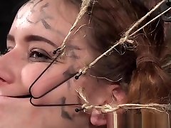 Submissive teen mouthgaped in a barrel