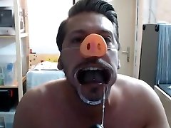 christian is playing with his dildo