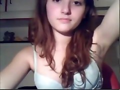 Brunette strips on webcam