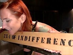 Redhead is strapped in judit farres01 bondage