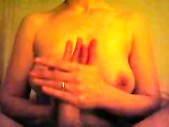 MILF gives a nice handjob to her partner