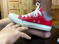 Ball crush with red Converse Chucks