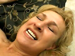 Salacious blond cougar likes to polish the knob while other dude is dancing chocolate cha-cha with her