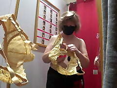 What bra to buy? Fat milf in the fitting room shaking her big mature tits.