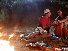 Hottest brunette in the world getting penetrated by the campfire