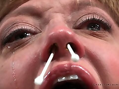 Busty white milf bound and poked with Q-tips in the nose