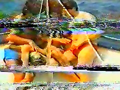 Dirty bitch pleases two horny studs in MMF threesome fucking on yacht in the open air