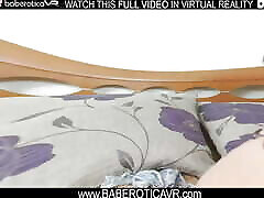 Solo brunette Katty West spreads her legs and rubs her shaved pussy in VR.